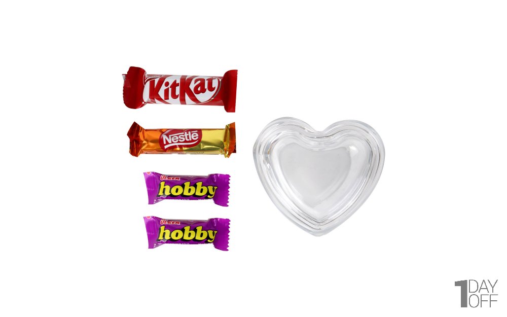 باکس شیشه‌ای کوچک قلبی ساچی همراه با دو عدد مینی شکلات هوبی/ یک عدد مینی شکلات کیت‌کت / یک عدد مینی شکلات نستله 