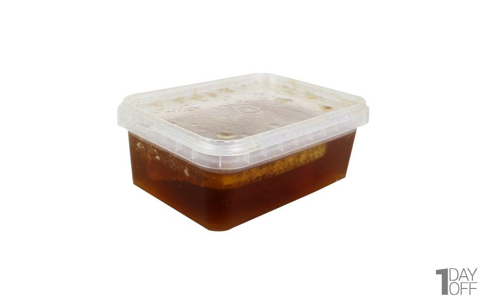عسل همراه با موم مقدار 1000 گرم